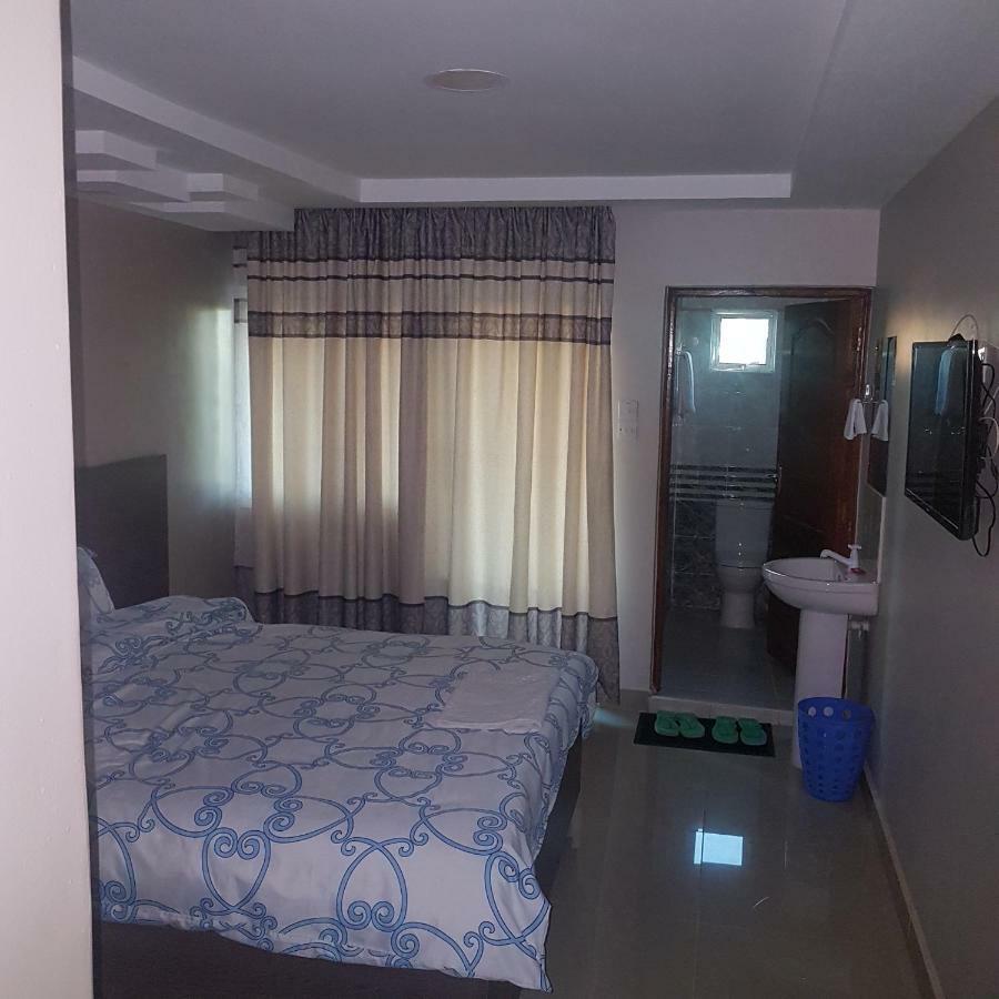 Adala Motel Meru Bagian luar foto